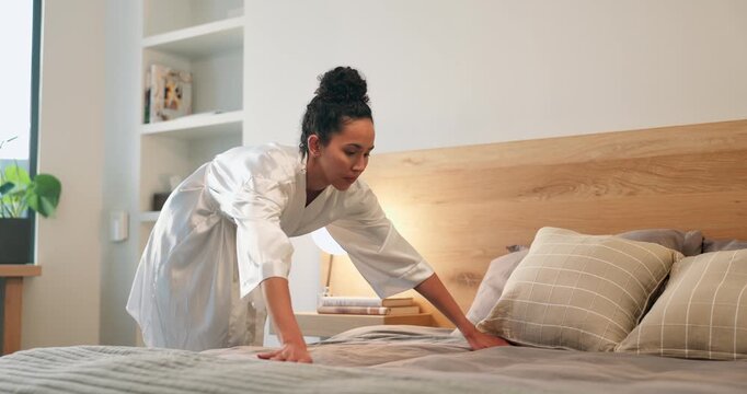Change, tidy and woman making bed in home for daily routine, fresh fabric or maintenance. Cleaning, morning and neat with person in bedroom of apartment for chores, housework or responsibility