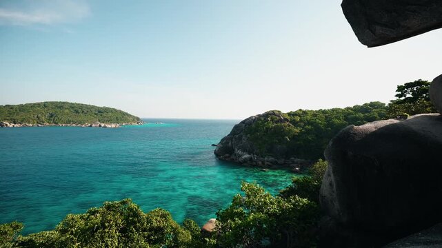 Turquoise bay and rocky islands from cliffside Island Similan in Phang Nga, Phuket Thailand.