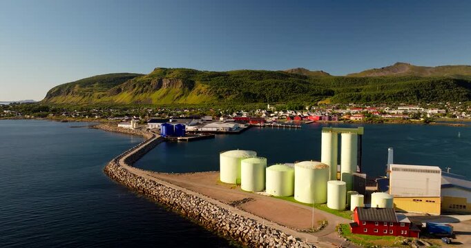 Fishing Industries, Seafood Processing, Waterfront Infrastructure, Melbu, Lofoten Islands, Hadsel Municipality, Norway, Cinematic Aerial View