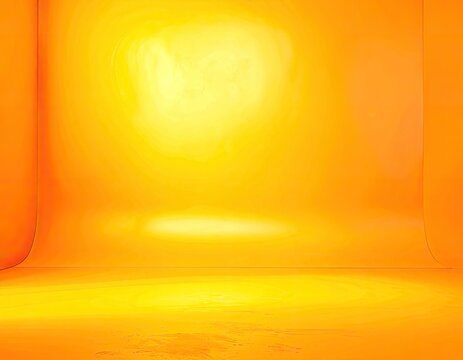 A brightly lit studio with a smooth, curved background and floor in warm yellow and orange tones.