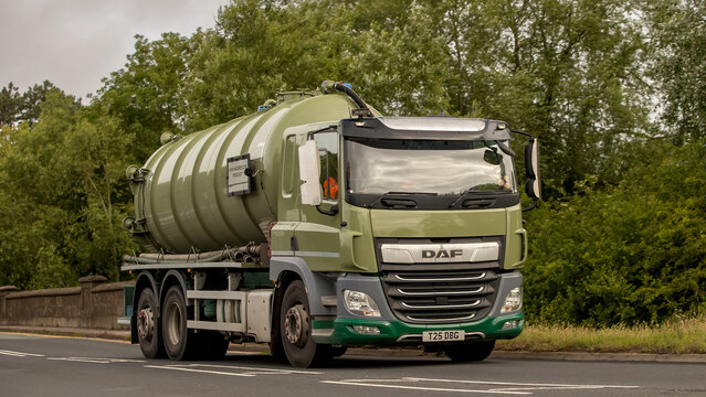 Stony Stratford,Bucks,UK - June 7th 2026: 2019 green DAF CF 410 tanker truck  driving on a British road