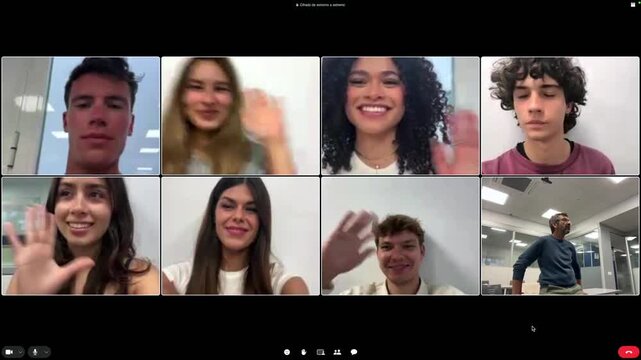 Group of multiethnic high school or college students listening to their male professor during a virtual lesson, waving hands at the camera and interacting during a live streaming session