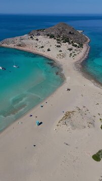 Explore the stunning landscapes of Simos Beach featuring soft sands and vibrant turquoise waters. Ideal for relaxation and adventure, Elafonisos Island Greece