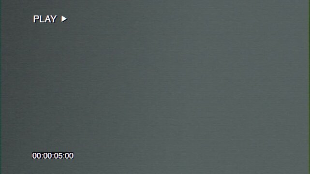 Retro television static and VHS tape noise overlay with flickering interference