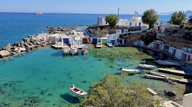 Discover the serene charm of Mandrakia, Milos Island Greece with its crystal clear waters and picturesque harbor.