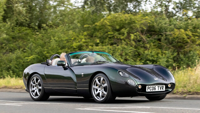 Stony Stratford,Bucks,UK - June 7th 2026: 2006 black TVR Tuscan  classic car driving on a British road