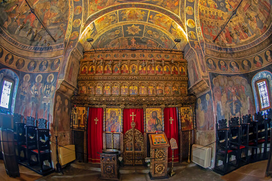 BUCURESTI, ROMANIA - JULY 16, 2018: Inside Stavropoleos monastery, founded in 1724 by the Greek monk Ioanikie Stratonikeas, a masterpiece of Brancovan architectural style. 