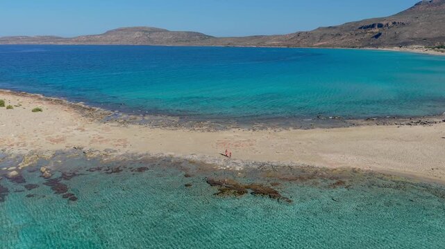 Discover the stunning Simos Beach, where golden sands meet crystal-clear waters. Enjoy the tranquil atmosphere and vibrant natural beauty, perfect for relaxation and exploration in Greece