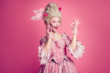 Fototapeta premium Photo of attractive charming lady queen wear classic baroque history dress isolated on pink color background