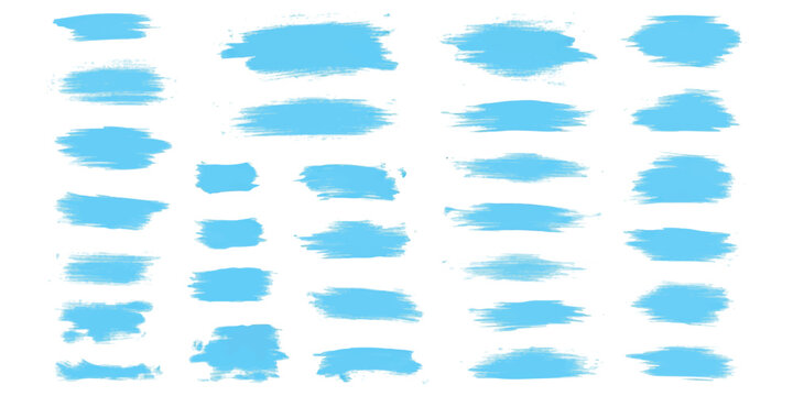 Set of blue paint brush strokes and ink texture shapes for artistic design
