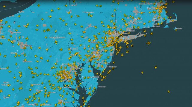 Air traffic radar map displaying dense commercial aircraft over eastern USA, aviation monitoring interface showing real time flight activity across regional airspace