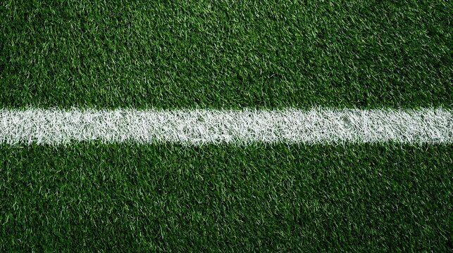 White painted boundary line on green artificial turf grass field