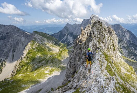 Hikers at the Lamsscharte, exposed rocky ridge, summit of Hochnissl, view of the basin with Lamsenjochh&uuml;tte and Stallental, hiking trail to Lamsenspitze, Vomper Kette, Karwendel Mountains, Alpenpark Karwendel, Tyrol, Austria
