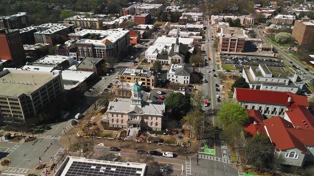 Downtown Athens Georgia with courthouse clock tower and church steeple from above