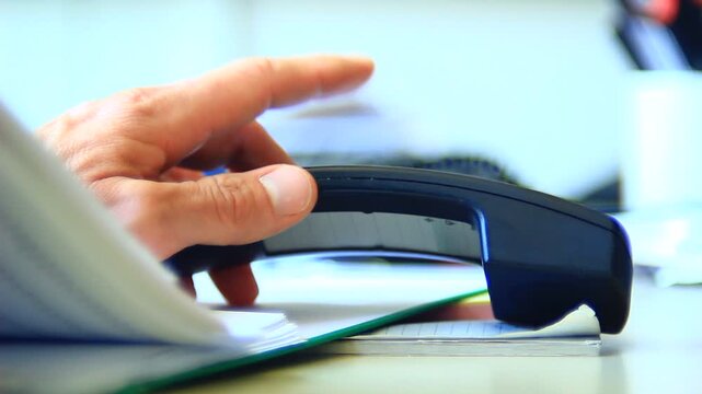 Using phone in the office.