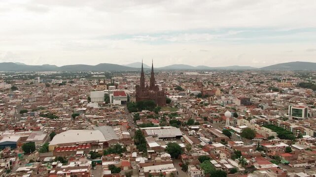 Zamora de Hidalgo City And Diocesan Sanctuary of Our Lady of Guadalupe In Michoacan, Mexico. - aerial shot