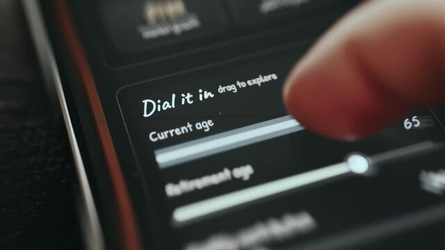 Person using a retirement calculator setting the current age and retirement age