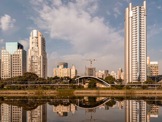 Obraz premium Modern skyline of Sao Paulo, with reflections in the Pinheiros River. Sao Paulo, Brazil.