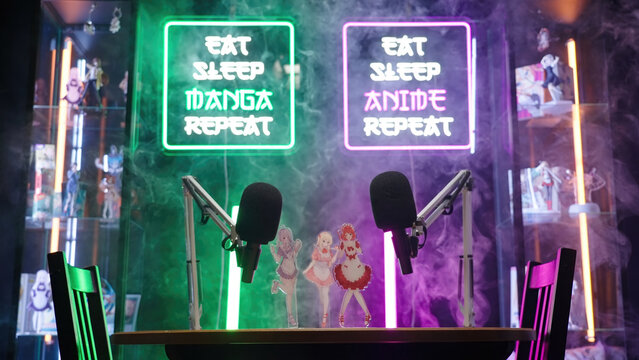 Anime and manga podcast studio with neon signs and microphones ready to shoot