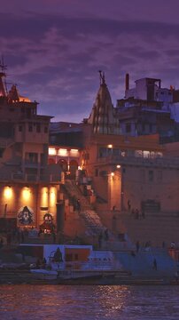 Varanasi, India. General View On Mata Anandamayi Ghat and Vaccharaja Ghat. Graffiti And Murals At Ghat. Derives Its Name From Illustrious Anandamayi Ma, Spiritual Luminary Of 20th Century. Evening At