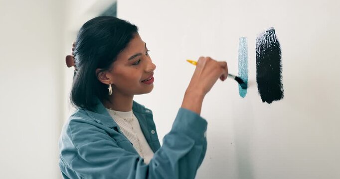 Brush, painting and thinking with woman in house for diy project or renovation decision. Choice, color and comparing with person in apartment for home improvement, makeover change or upgrade