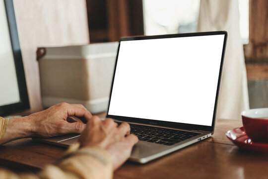 computer screen,mobile phone blank mockup.work using laptop texting cell phone.white background for advertising,contact business search information on desk.marketing,design