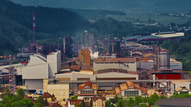 Aerial view of beautiful industrial town of Leoben in the mountains in central Austria with heavy industry and metallurgy