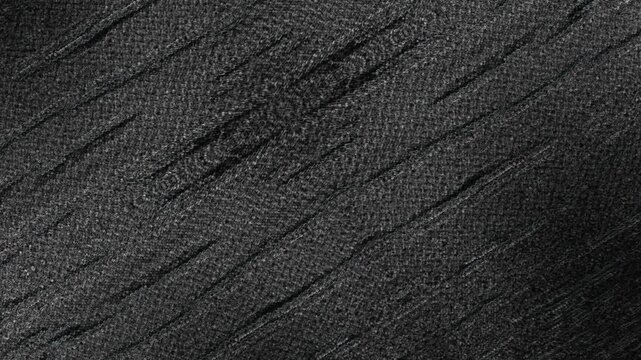 Dark woven textured surface with diagonal scratches, subtle depth, and rugged appearance throughout. Grunge texture background animation.