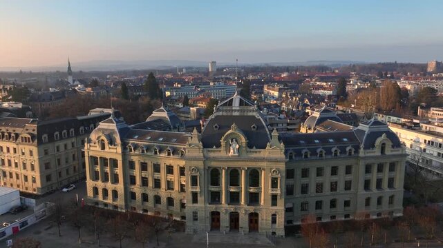 Bern, The Capital of Switzerland from above in Evening Sunset Light at Winter. Aerial Drone shot.