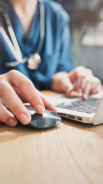Healthcare professional working on patient documents