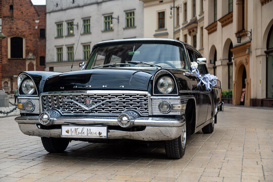 Gaz 13 Chaika parked in Krakow, Poland with decorations for a wedding celebration