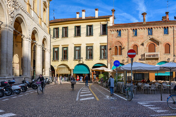 Naklejka premium Old square with tables of restaurant in in Padua (Padova), Veneto, Italy. Cozy cityscape of Padua