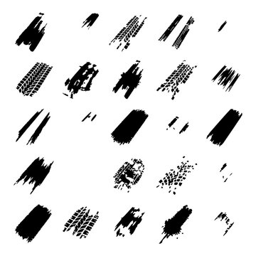 Collection of grungy tire track brush strokes and offroad vehicle mud prints with grunge brush print texture tire mark pattern brush wheel track isolated