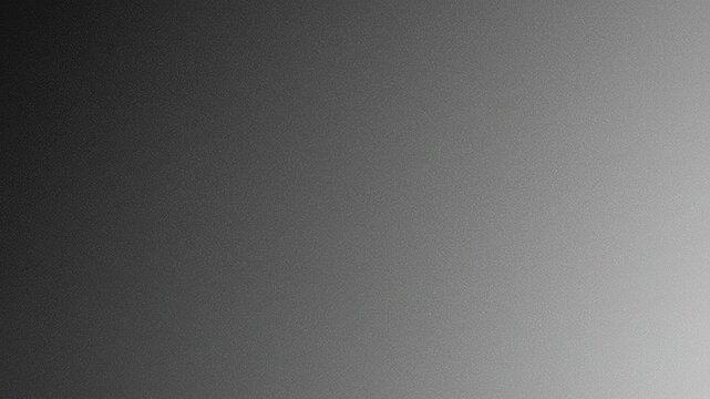 Grayscale surface with subtle texture and soft gradient