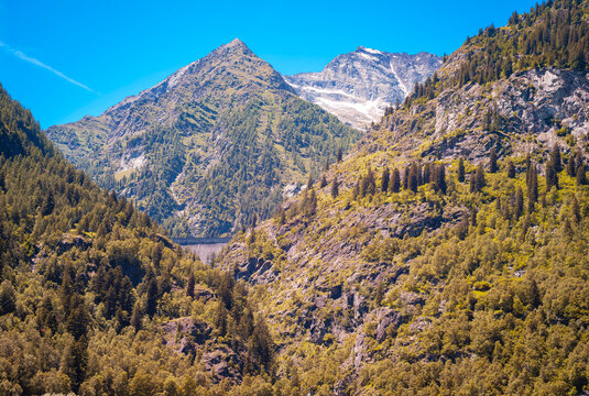 Summer panorama of the mountains surrounding the village of Antronapiana, in the Antrona Valley, near the Italy-Swiss borders (Piedmont, Northern Italy).