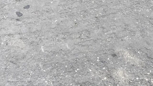 Top Down View of Rough Asphalt Pavement Texture Background