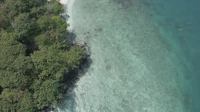 Top Down Aerial Of White Sand Spit With Outrigger Boats Lampung