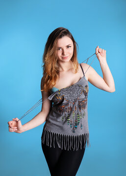 Young woman wearing dreamcatcher tank top