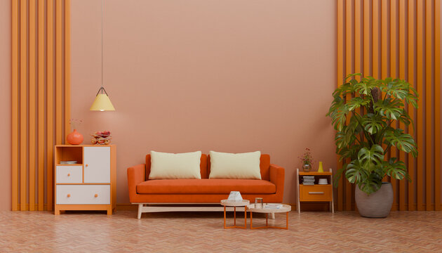 Vibrant Living Room Scene Showcasing Orange Sofa Accent Lighting Indoor Greenery Warm Color Palette And Contemporary Residential Styling
