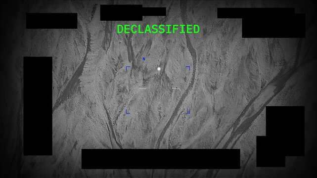 Military or Air Force official looking declassified video proof of UFO activity. Found footage from government leaked file archive. Unidentified Anomalous Phenomenon UAP. Jet camera or drone capture 