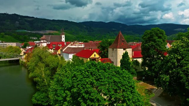 Aerial view of beautiful industrial town of Leoben in the mountains in central Austria with heavy industry and metallurgy