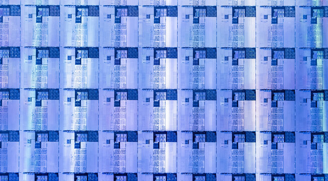 blue silicon wafer for manufacturing semiconductor of integrated circuit.Electronic circuit designs have been built onto the wafers using micromaching including photolithography