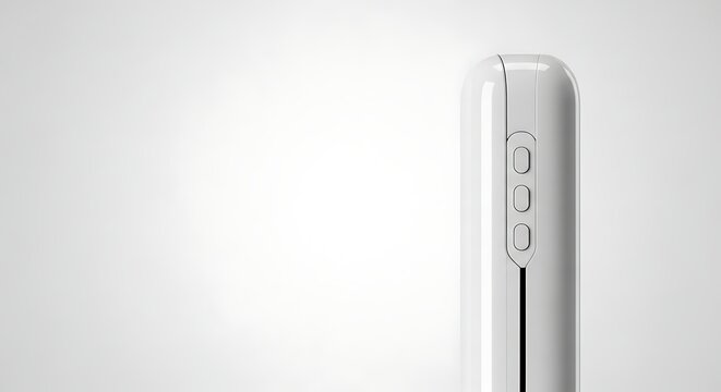 Closeup of a sleek white electronic device with buttons on side