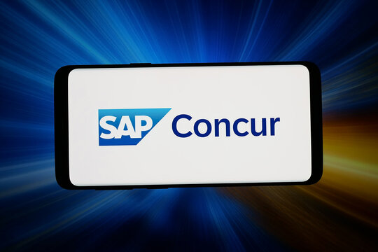 Stuttgart, Germany - 06-11-2026: In this photo illustration, the logo of expense management software SAP Concur is displayed on a smartphone in front of abstract background on computer screen.