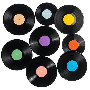A collection of seven vinyl records with colored labels