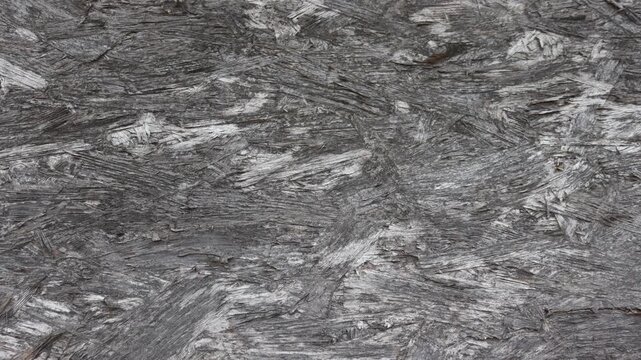Weathered OSB Board Texture Background - Slow Pan Across Aged Oriented Strand Board Surface in 4K