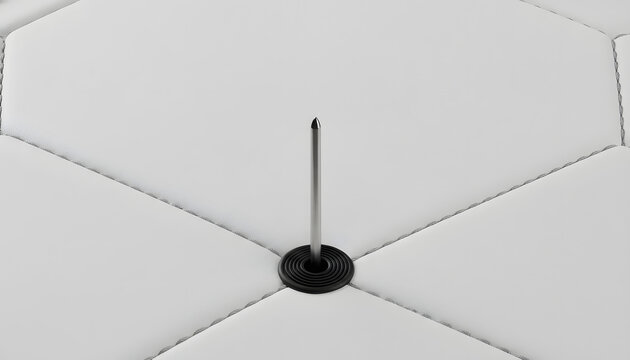 Macro Close Up of a Stainless Steel Inflation Needle Inserted into a Black Rubber Valve of a Premium White Synthetic Leather Soccer Ball