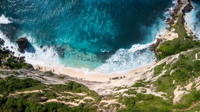 Diamond Beach Nusa Penida turquoise ocean and sandy shore aerial overhead photo Bali