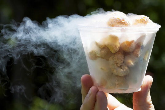 Dragon's breath liquid nitrogen snack with smoke and vapor effect.