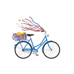 Fototapeta premium Blue vintage bicycle decorated with patriotic ribbons and a basket of flowers.